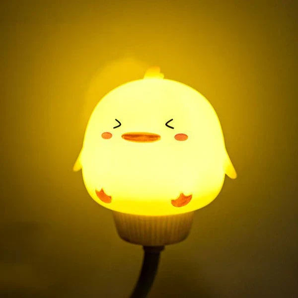 Adorable animal LED nightlight for children's bedtime. Timer function & remote control. USB powered cozy light.