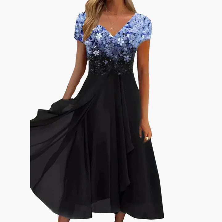 Women's elegant floral shimmer midi cocktail dress, perfect for special occasions & wedding guests.