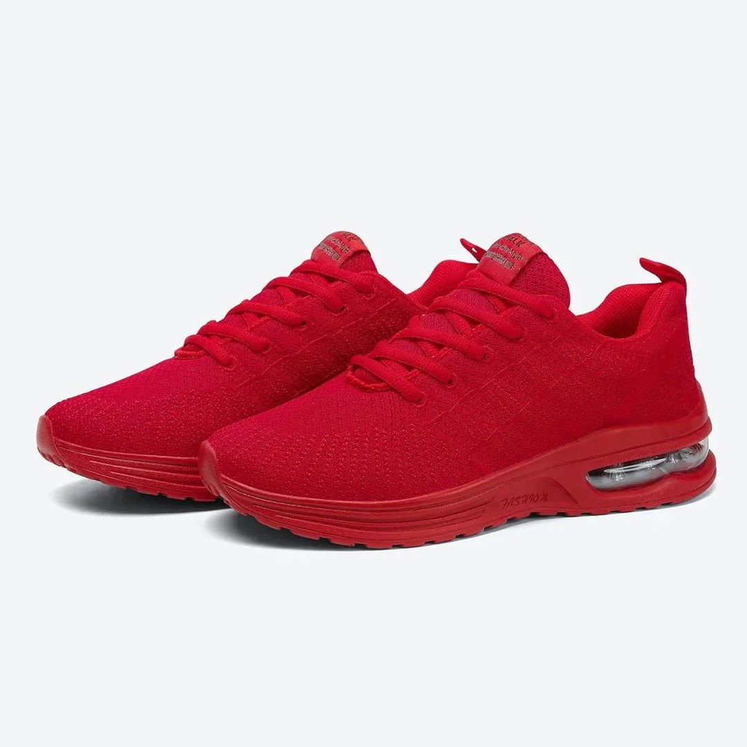 White casual women's sneakers, ideal for daily walking.