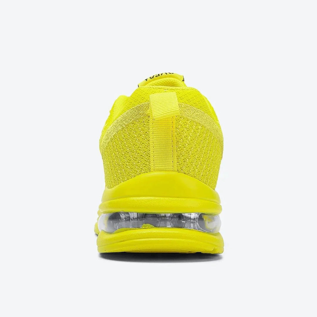 Bright yellow women's walking shoes with air cushion sole.
