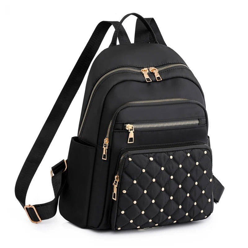 Lightweight water-resistant nylon backpack for women, ideal for travel, school & daily use. Khaki color.