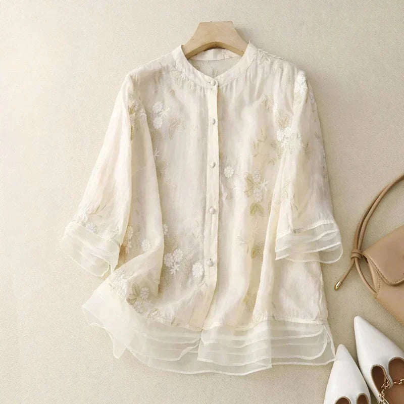 Women's Odalys loose floral embroidered blouse. Effortless chic & comfortable for spring fashion.