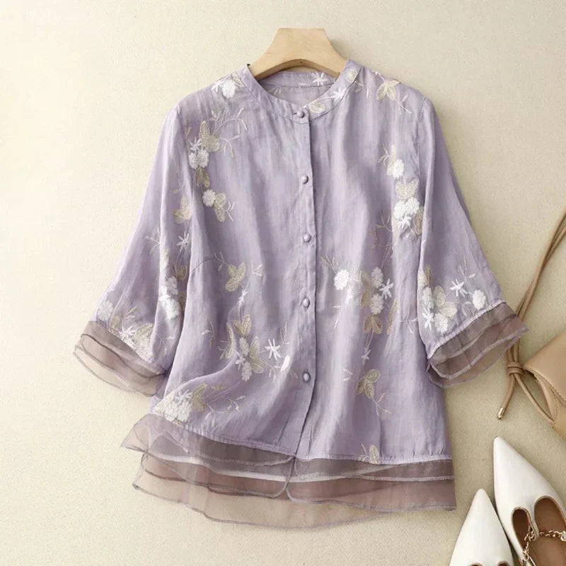 Odalys floral embroidered blouse for women, featuring a loose fit, long sleeves & button front closure.