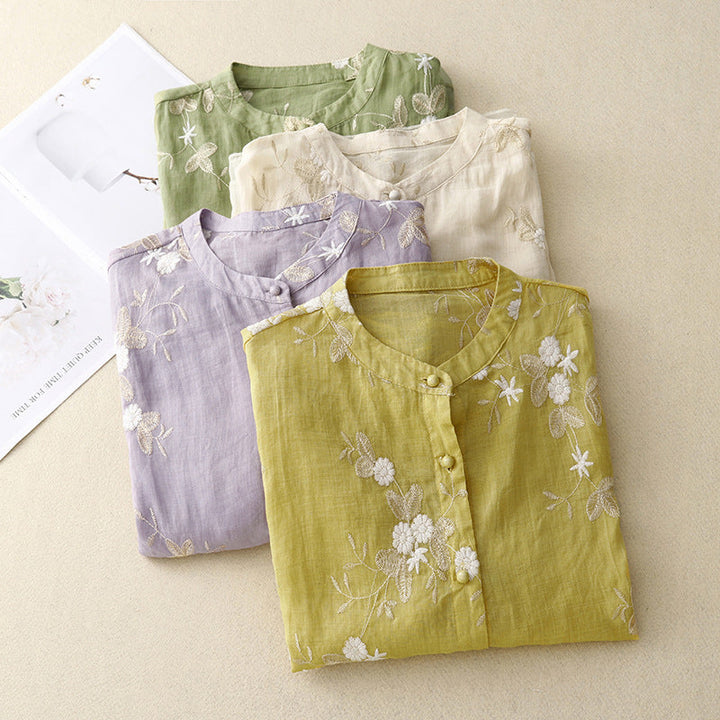 Comfortable women's loose fit floral blouse with intricate embroidery. A versatile spring fashion top.