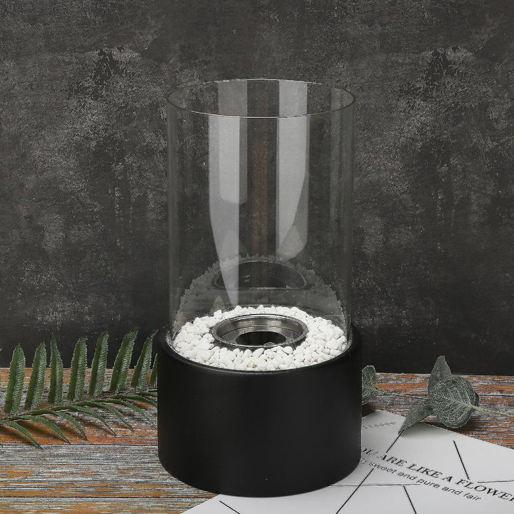 Sleek modern tabletop oil lamp with a stone base, perfect for creating ambient indoor lighting and decor.