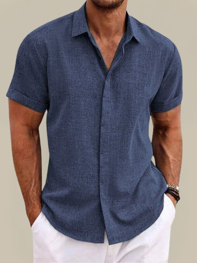 Men's sophisticated relaxed fit short sleeve button-up casual shirt for summer wear.
