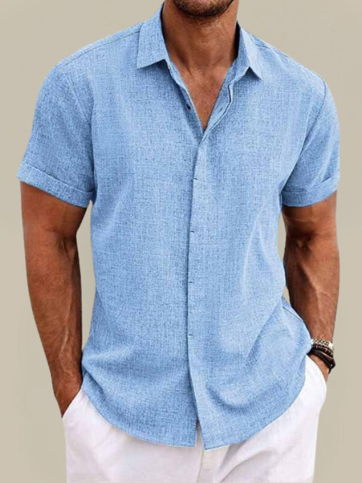 Relaxed fit men's short sleeve button-up casual shirt, perfect for warm weather and summer style.
