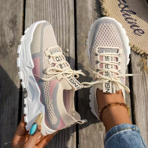 Lightweight women's walking sneakers, offering ultimate comfort & support for everyday wear. Breathable design.
