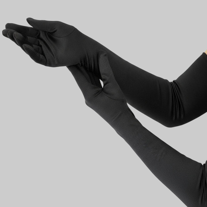White elegant women's long opera gloves, ideal for wedding or bridal special occasions and parties.