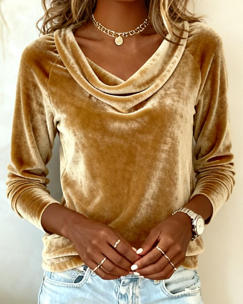 Close-up of the elegant cowl neck on a women's long sleeve top, highlighting the graceful drape & design.