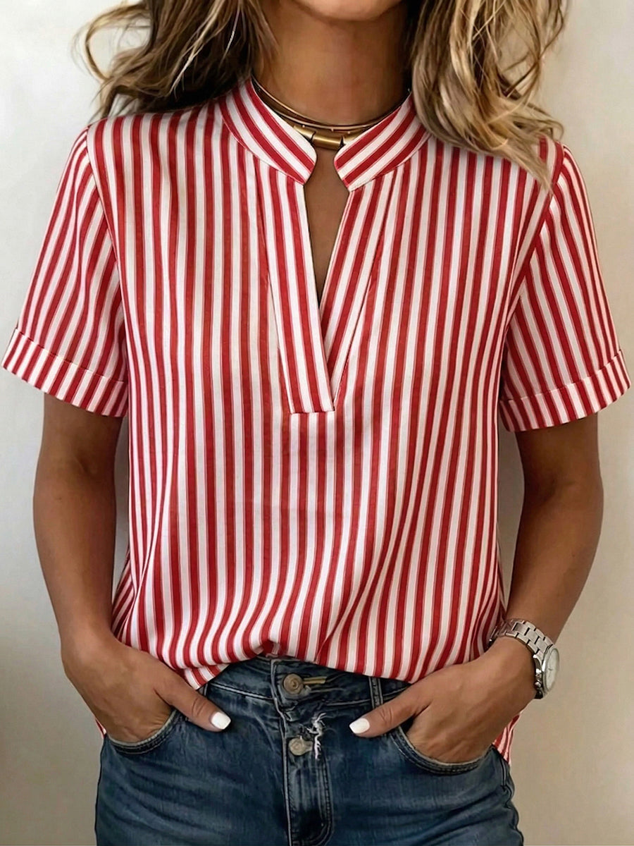 Women's striped V-neck tunic blouse with short sleeves, ideal for casual summer comfort.