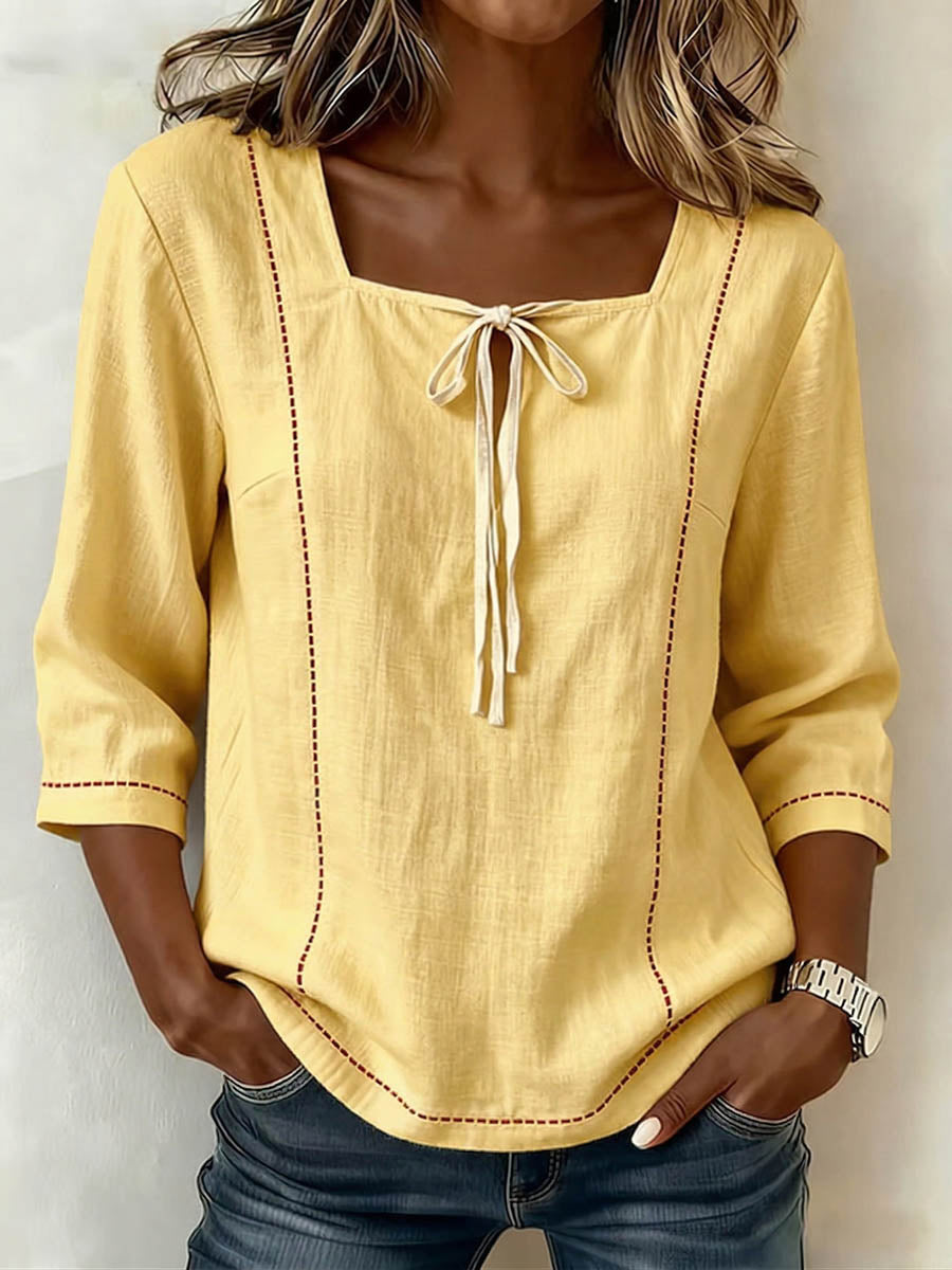 Chic women's square neck blouse with elegant 3/4 sleeves, offering a professional yet fashionable look.
