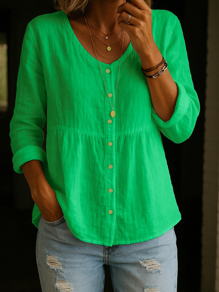 Women's button-down long sleeve tunic blouse, a versatile top for spring fashion, offering comfort and style.