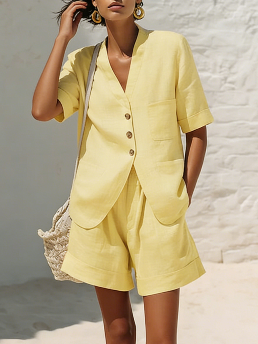 Elegant women's V-neck blazer and tailored shorts two-piece set, perfect for spring/summer professional chic.