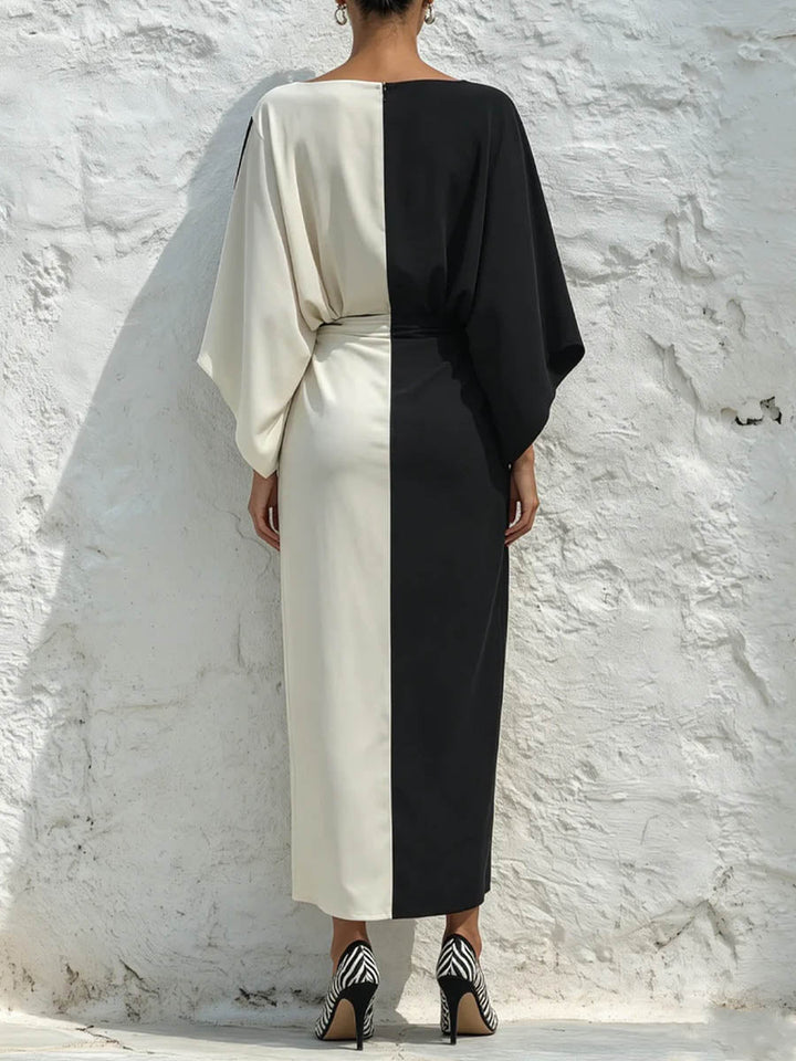 Comfortable batwing sleeve maxi dress for women featuring a chic colorblock design & practical pockets.