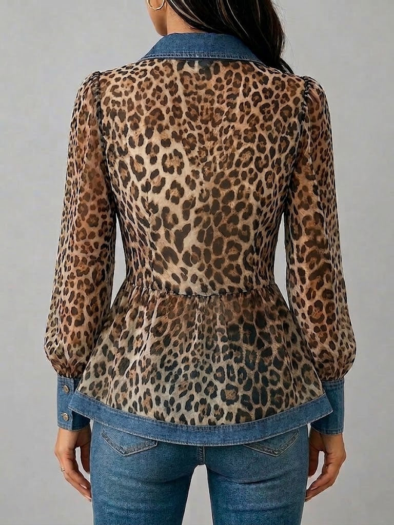 Fashionable women's collared button-down blouse featuring a bold leopard print and chic denim trim detail.