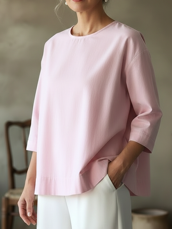 Soft, comfortable women's long sleeve blouse. Loose fit for everyday wear, perfect casual crew neck top.