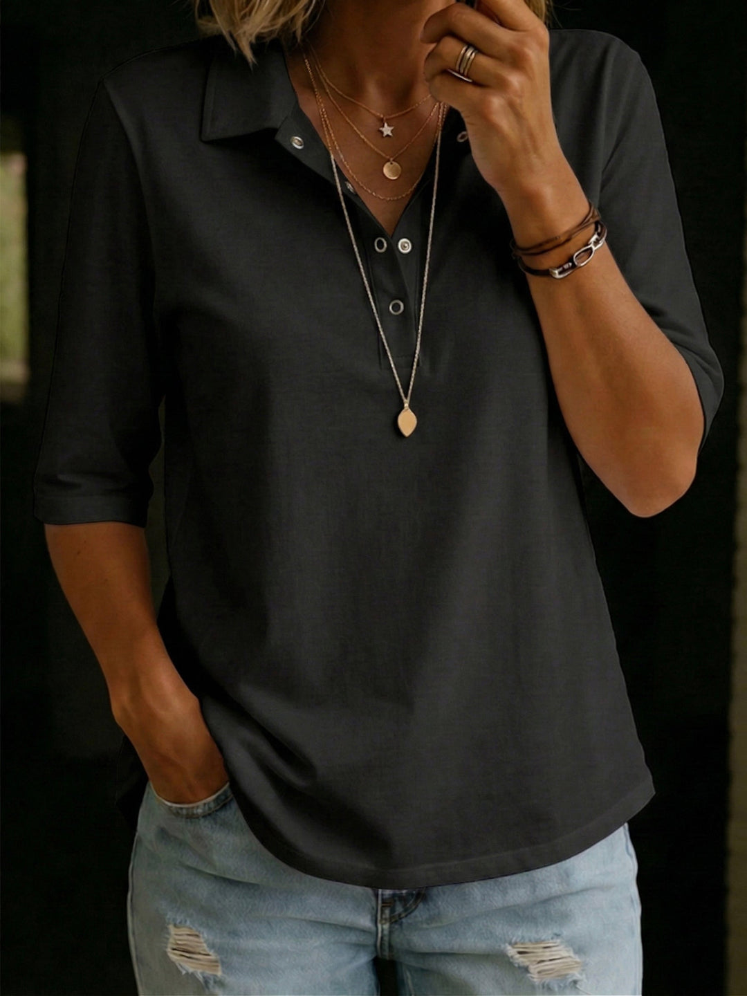 Women's elegant knit polo V-neck button top. Perfect as an office blouse, casual wear, or versatile daily outfit.