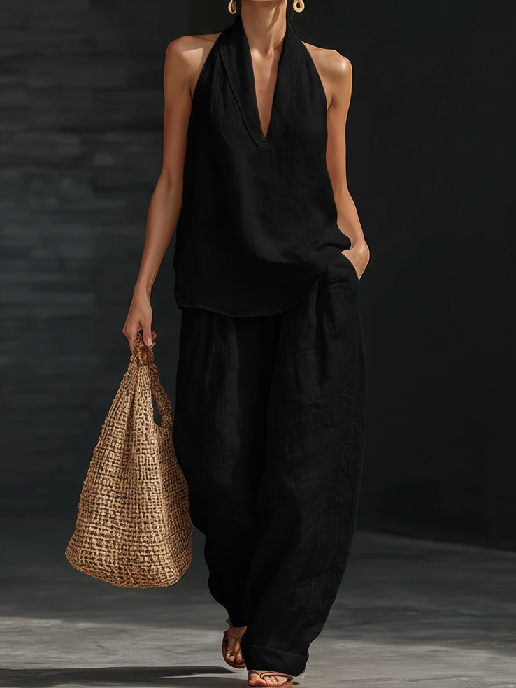 Comfy & versatile women's matching halter top and wide leg pants set for casual summer elegance.
