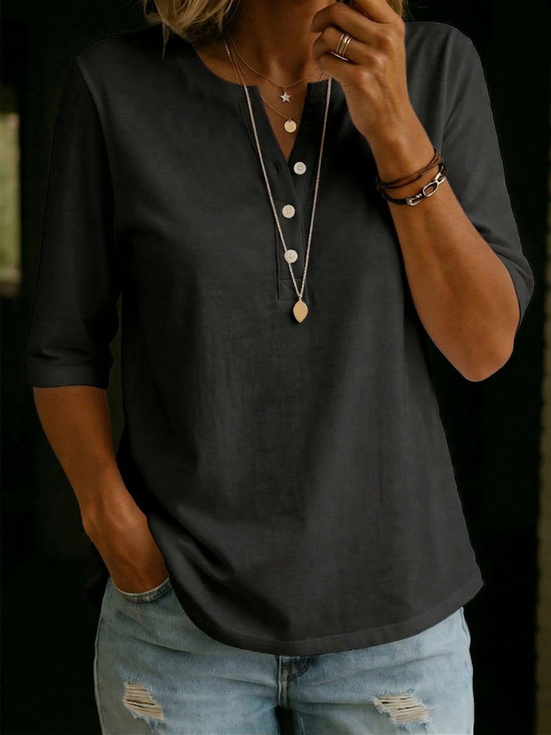 Spring/summer women's 3/4 sleeve henley top. Comfortable, casual shirt ideal for everyday and relaxed wear.