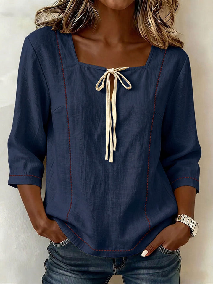 Fashionable women's square neck 3/4-sleeve blouse, an elegant choice for spring and summer professional outfits.