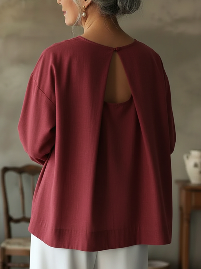 Front view of a women's loose fit long sleeve blouse. A chic and versatile casual top for everyday comfort.