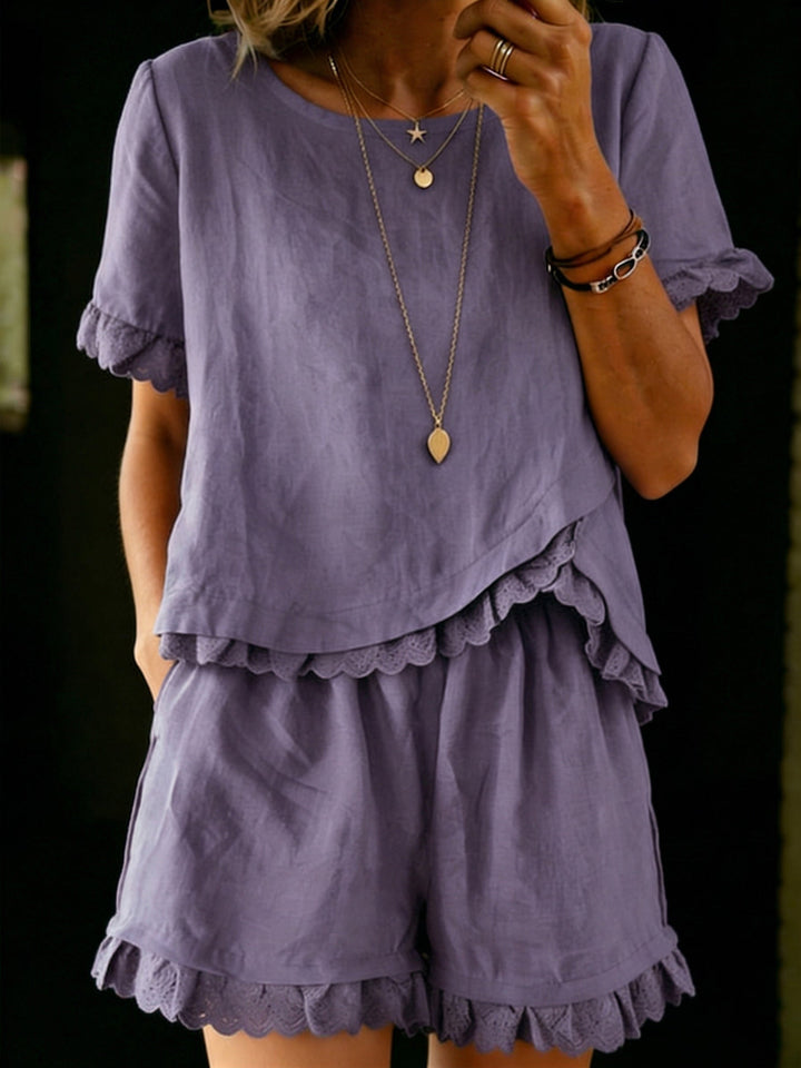 Women's casual ruffle top and shorts set. Comfortable two-piece summer outfit for everyday style.