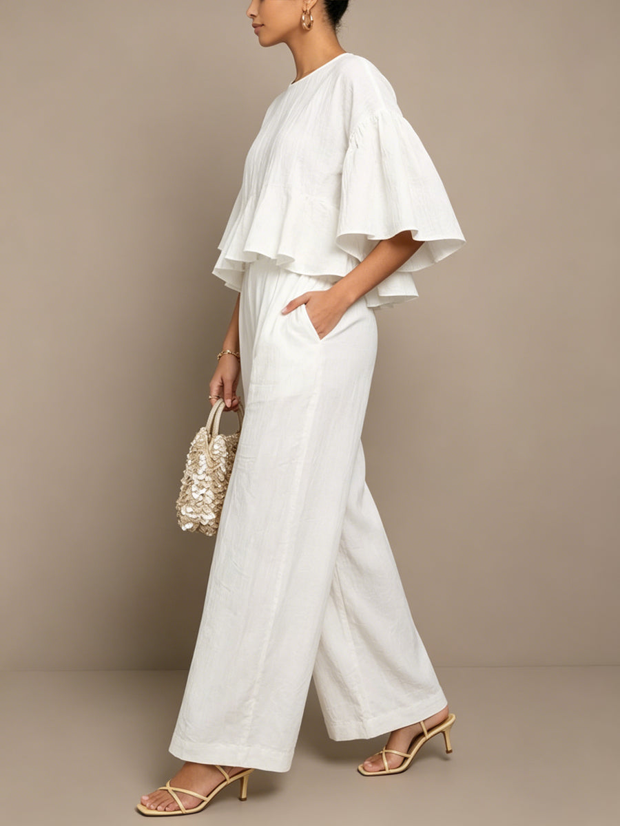 Coordinated women's ruffle top & wide-leg pants set. Versatile spring fashion, perfect for elegant daily wear.