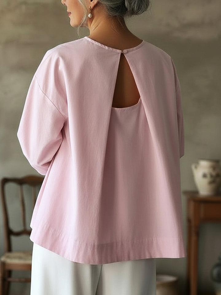 Versatile women's long sleeve top, loose fit, ideal for casual everyday style. Crew neck blouse.