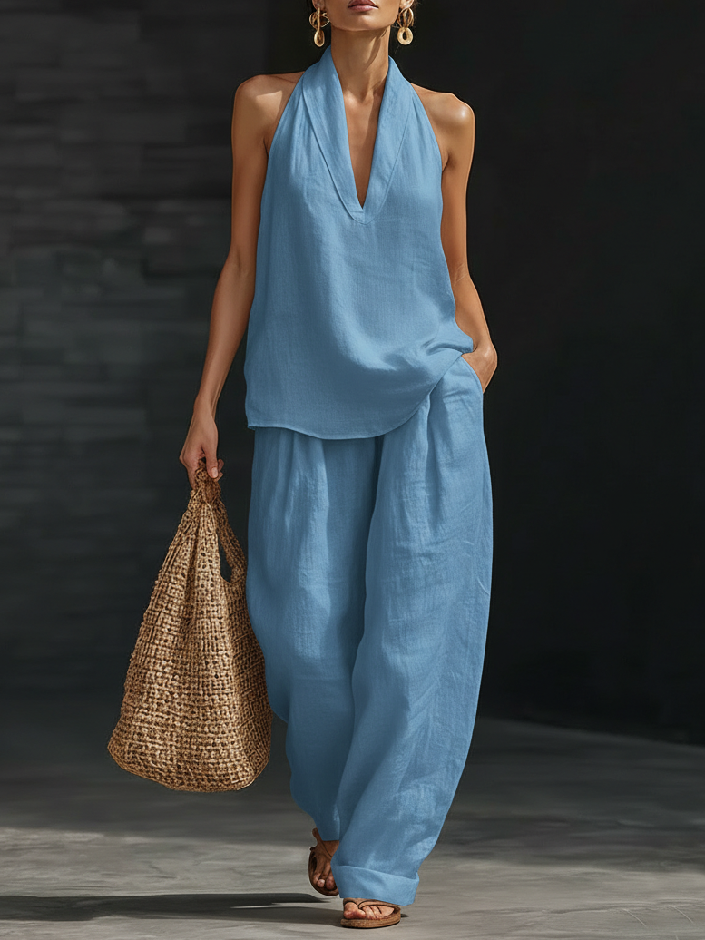 Stylish women's two-piece set featuring a halter top and wide leg pants, great for resort & vacation.