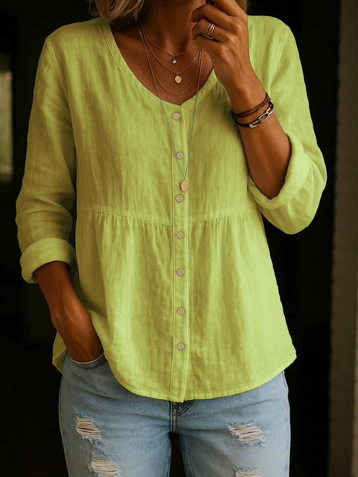 Relaxed fit women's long sleeve tunic top, a comfortable and stylish blouse for versatile spring and summer wear.