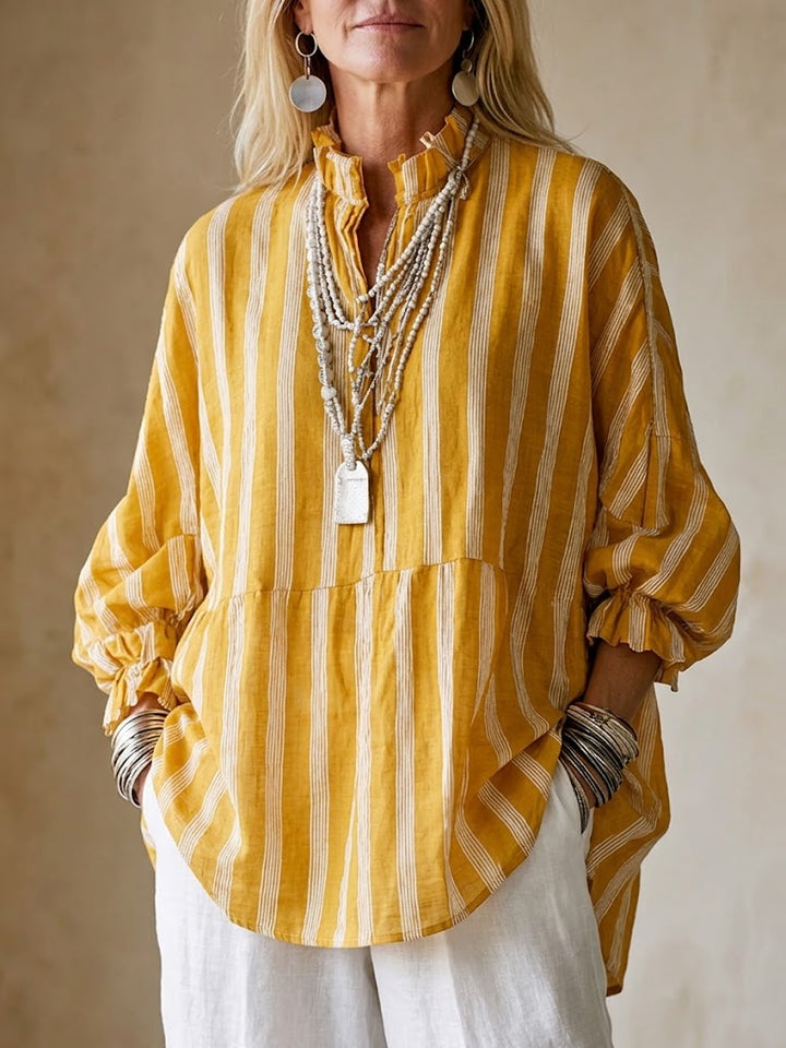 Women's striped V-neck ruffle blouse with stylish lantern sleeves, perfect for a casual summer or boho look.