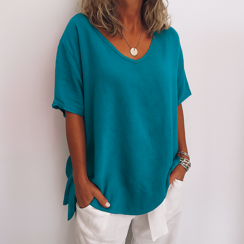 Comfortable women's relaxed fit short sleeve top with scoop neck for effortless everyday casual wear.