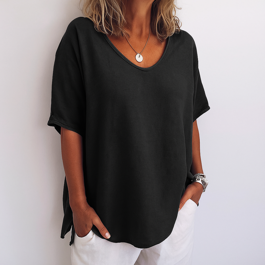 Plus size women's relaxed fit short sleeve top, scoop neck. Comfortable basic for everyday casual style.