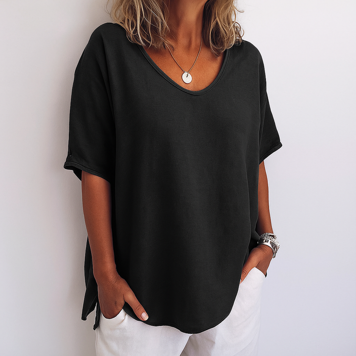 Plus size women's relaxed fit short sleeve top, scoop neck. Comfortable basic for everyday casual style.