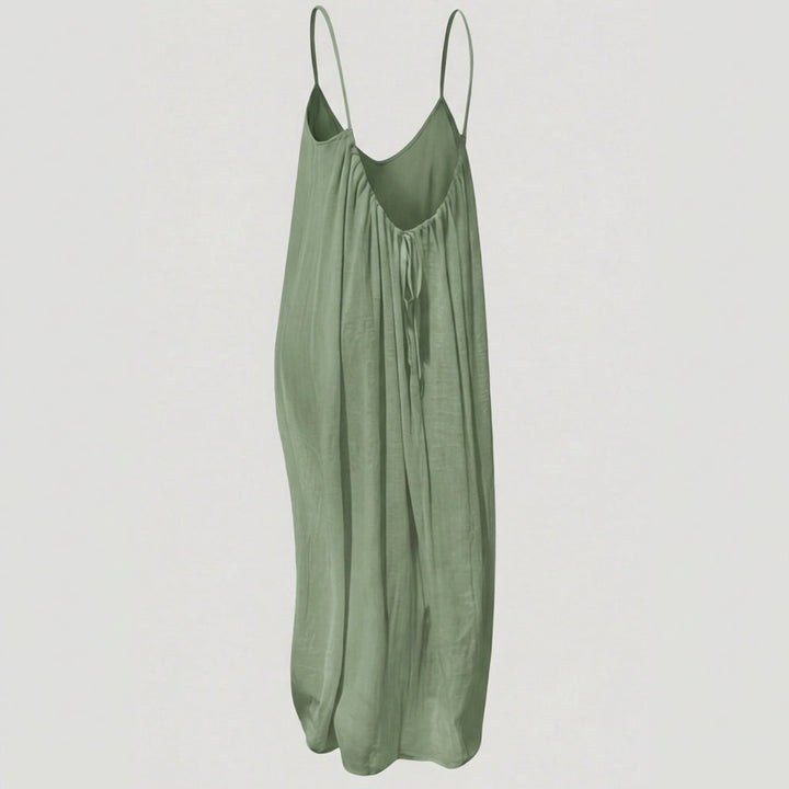 Simple yet elegant flowy maxi dress for women with a chic open back, summer essential.