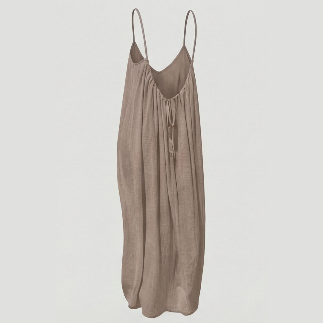 Women's flowy open back maxi dress, offering effortless summer style & comfort.