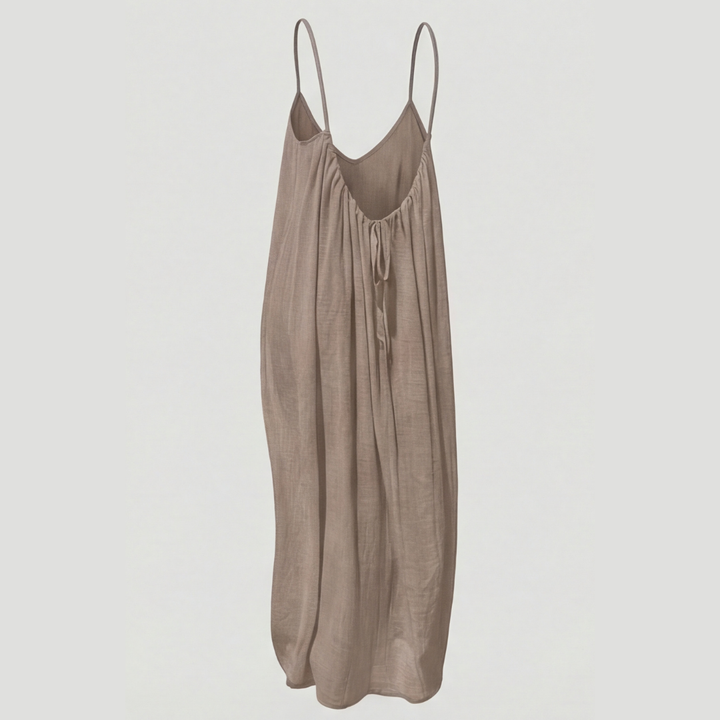 Women's flowy open back maxi dress, offering effortless summer style & comfort.