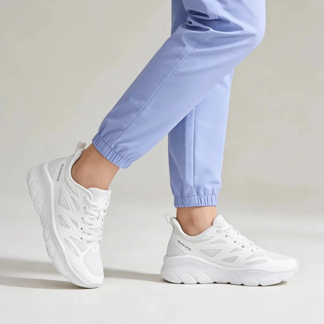 Lightweight women's work shoes, black, with anti-fatigue technology for standing comfort.