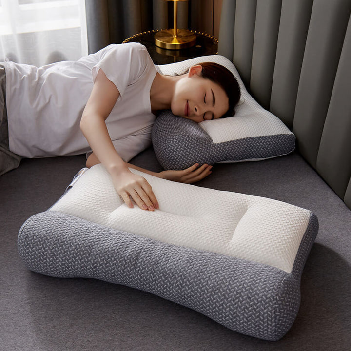Ergonomic orthopedic sleep aid pillow ensures comfort & proper spinal alignment.