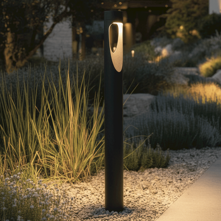 Durable weather-resistant LED outdoor floor lamp, tall design with a sleek round base for exterior lighting.