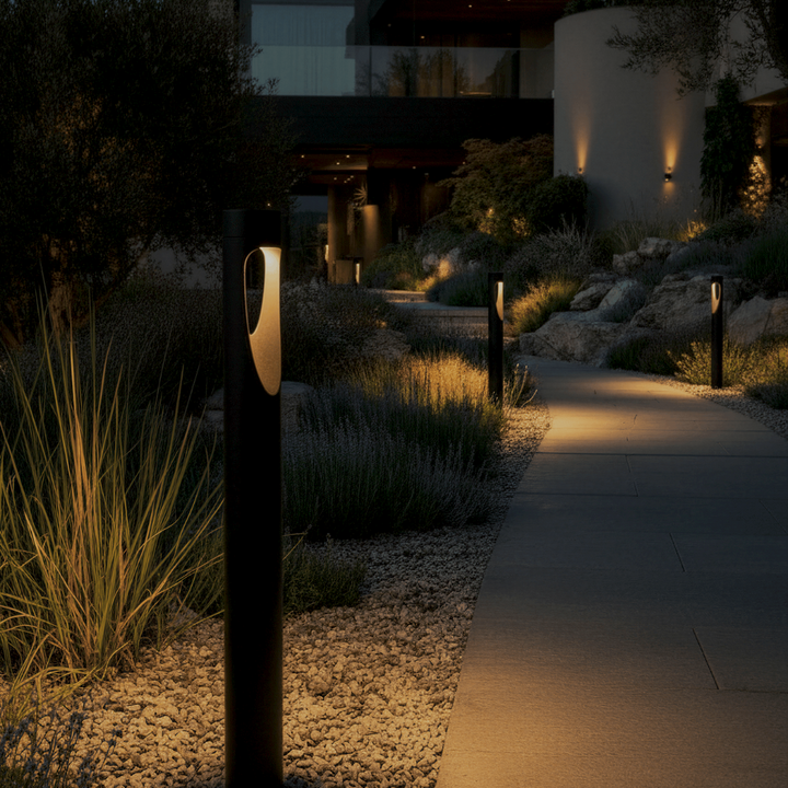 Modern outdoor tall LED floor lamp, weather-resistant with a sturdy round base for durable landscape lighting.