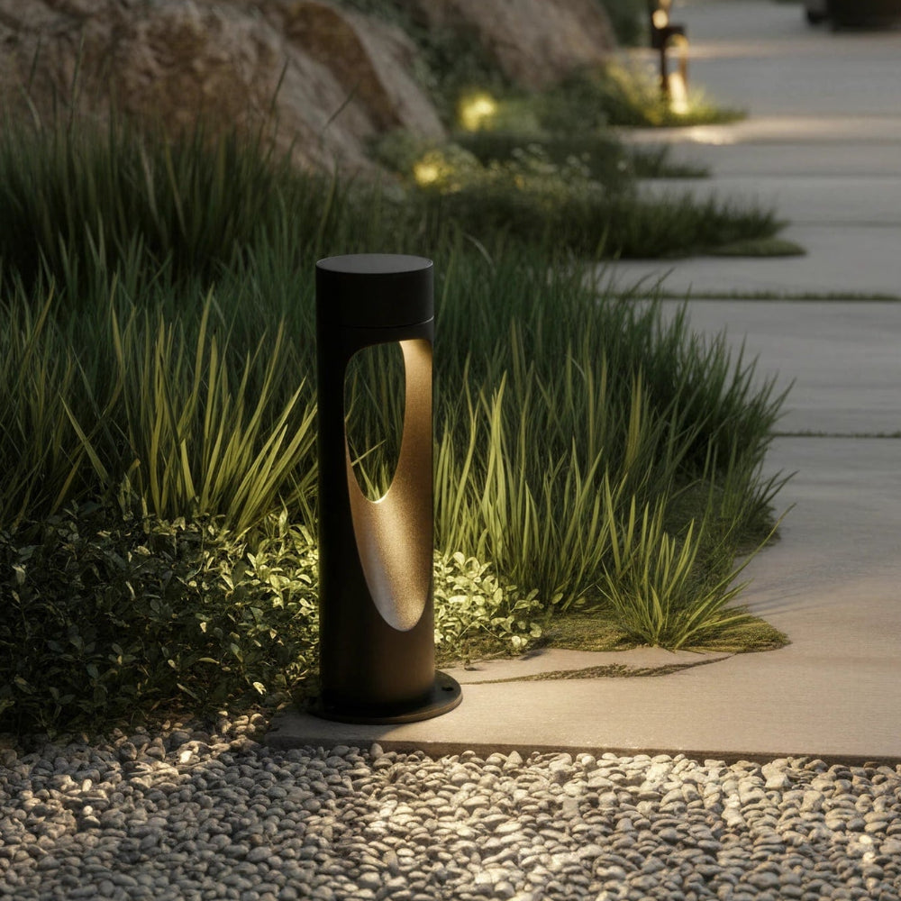 Modern outdoor LED floor lamp, weather-resistant, tall with a round base for patio or garden lighting.