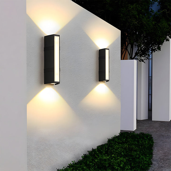Clean black minimalist LED tube wall light, perfect for modern outdoor architectural lighting & energy saving.
