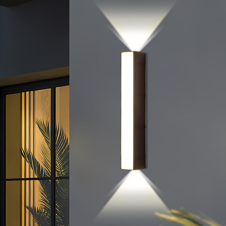 Durable LED outdoor wall light tube in black, energy-efficient for reliable modern exterior illumination.