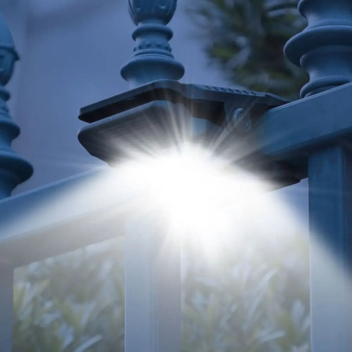 Bright outdoor solar lamp providing security lighting for pathways. Waterproof and energy-efficient motion sensor.