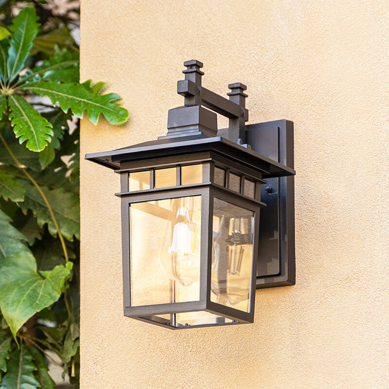 Durable waterproof outdoor wall lantern, ideal exterior lighting. Black aluminum porch lamp designed for all weather.