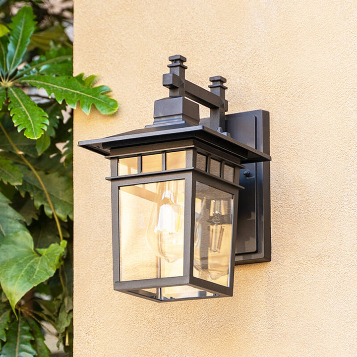 Durable waterproof outdoor wall lantern, ideal exterior lighting. Black aluminum porch lamp designed for all weather.