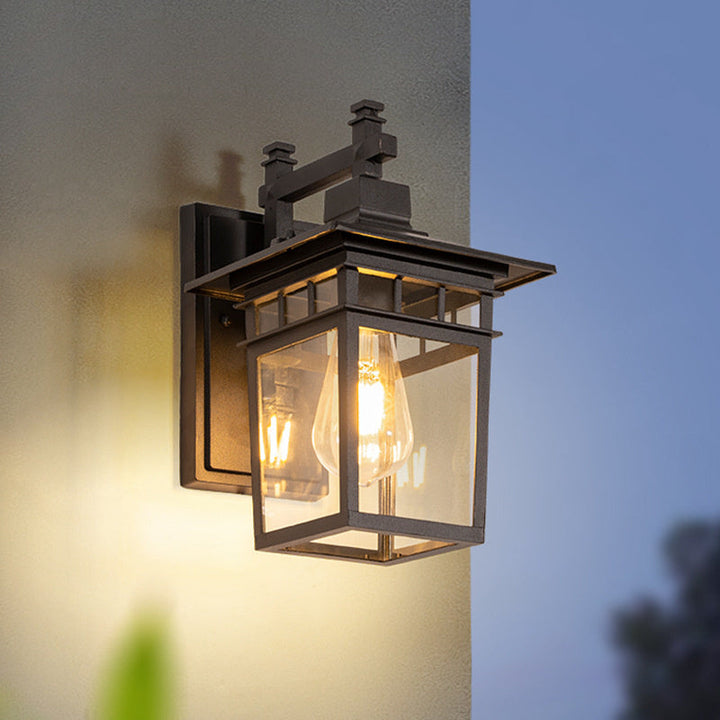 Waterproof outdoor wall light lantern for porch and patio decor. Black aluminum garden light provides exterior illumination.
