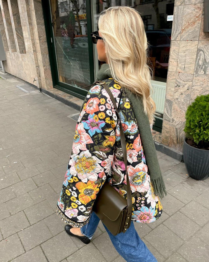 Ladies' chic floral padded winter jacket, Evelyn. Warm, fashionable coat with a beautiful print for cold weather.